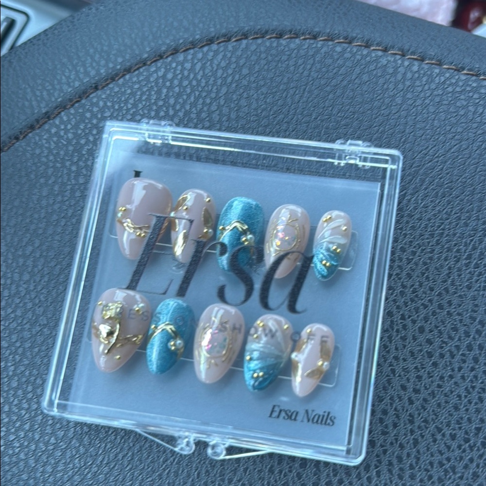 Chic Blue and Cream Press-On Nails with Winter Sparkle